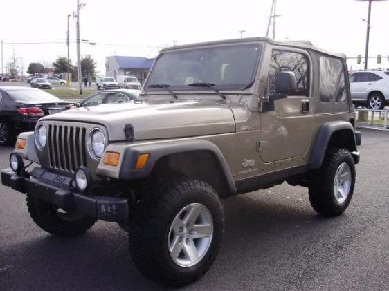 Any Pics Of 2000 Tj 2.5 W  32x10.5 On New Jeep Rubicon Rims? 